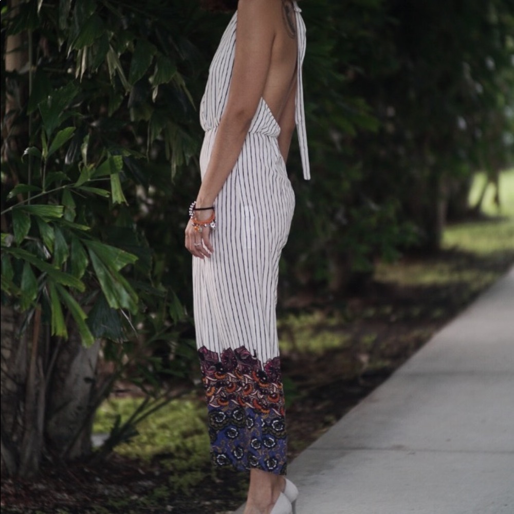 Stripe jumpsuit open in the back size SMALL